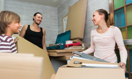 Packing boxes carefully for a house move in Mill Hill