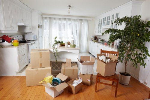 Local movers handling a flat move with stairs and careful access planning