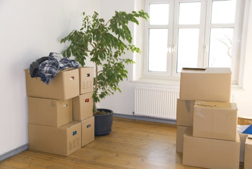 Boxes and household items prepared for a Mill Hill removal van service