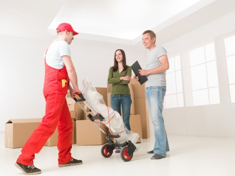Removal vehicle and moving supplies prepared for a Mill Hill moving day