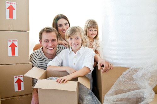Packed household boxes and furniture prepared for home removal