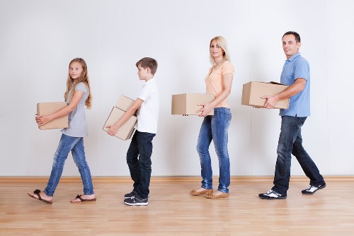 Packed boxes and furniture ready for a local house removal