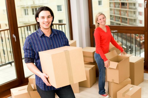 Checklist and packed moving boxes ready for a house move in Mill Hill